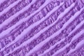 Purple clay alginate face mask, body wrap, make-up eyeshadow texture close up, selective focus. Abstract lavender background