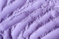 Purple clay powder alginate face mask, body wrap, make-up eyeshadow texture close up, selective focus. Royalty Free Stock Photo