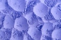 Purple clay powder (alginate face mask, hair shampoo, eye shadow) texture close-up. Abstract lavender background Royalty Free Stock Photo