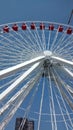 Purple closeworms eye view ferris wheel amusement park ride in the city Royalty Free Stock Photo