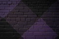 Purple color brick wall texture background. Surface with various squares and rhombuses