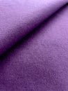 Purple color canvas texture folded fabric background