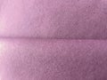 Purple color canvas texture folded fabric background