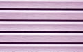 Purple color plastic panel wall pattern. Royalty Free Stock Photo