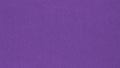 Purple colored paper texture. Bright summer wallpaper. Deep violet background. Textured surface, fibers and irregularities are