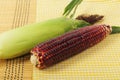 Purple corn fruits on napery Royalty Free Stock Photo