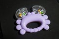 Purple crab toy with small balls inside Royalty Free Stock Photo