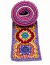 Purple Crochet Scarf with Colorful Flower Pattern on White Background in Studio Light Royalty Free Stock Photo