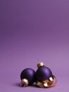 Purple crocus in the city vintage Christmas baubles on a purple background Royalty Free Stock Photo