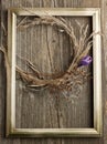 Purple crocus flower and dry wreath