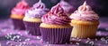 Purple cupcakes with buttercream frosting. Delicious muffins for a wedding or celebration. Panoramic image. Royalty Free Stock Photo