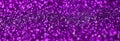 Purple decorative sequins. Background image with shiny bokeh lights from small elements Royalty Free Stock Photo