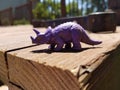 Purple dinosaur on deck