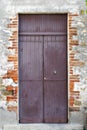 Purple Door on a Street in Italy