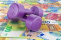 Purple Dumbbells for Strength Training on the euro background, 3D rendering