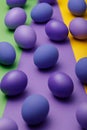 Purple easter eggs on a colored background Royalty Free Stock Photo
