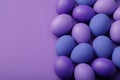 Purple easter eggs on a paper background