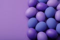 Purple easter eggs on a paper background Royalty Free Stock Photo