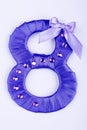 Purple eight on white background