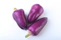 Purple exotic color bell peppers white background. Royalty Free Stock Photo