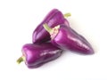 Purple exotic color bell peppers white background. Royalty Free Stock Photo