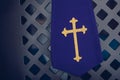Purple fabric stole in confessional in church