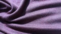 Purple fine merino wool knit. Violet knitted fabric.