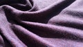 Purple fine merino wool knit. Violet knitted fabric.