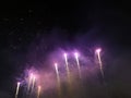 Purple fireworks trail in the night sky Royalty Free Stock Photo