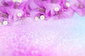 Purple flower Bougainvillea frame on bokeh glitter background with copy space ,idea for valentine card