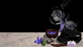 Purple flowers, bowl of flowers, pumice stone, qigong balls with