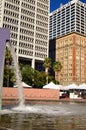 A purple fountain gushes in Pershing Square,