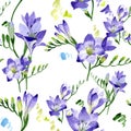 Purple freesia. Seamless background pattern. Fabric wallpaper print texture.
