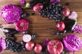 Purple fruits and vegetables. Blue onion, purple cabbage, eggplant, grapes and plums