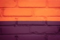 Purple or fuchsia and orange brick wall texture background. Street art detail. Colour block. Geometric pattern, line on house wall Royalty Free Stock Photo