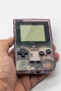 Purple Game Boy Pocket, Vintage portable game by Nintendo. Illus Royalty Free Stock Photo