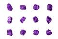 Purple gem stones white background isolated close up, raw gemstones, mineral samples, amethyst, sapphire, topaz, spinel, tanzanite Royalty Free Stock Photo