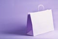Purple gift bag on a vibrant background Royalty Free Stock Photo