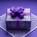 Purple Gift Box with Bow on Patterned Background Royalty Free Stock Photo