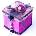 Purple gift box with a rose isolated. Royalty Free Stock Photo