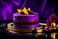 Purple glazed cake on party table