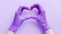The purple gloves heart. AI generated Royalty Free Stock Photo