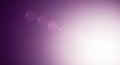 Purple gradient background with lens flare effects. The image transitions from dark Royalty Free Stock Photo