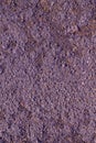 Purple Granite rock closeup background, stone texture, cracked surface Royalty Free Stock Photo