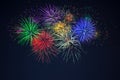 Purple green red blue yellow celebration fireworks Royalty Free Stock Photo