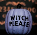 A Purple Halloween Pumpkin Saying Witch Please