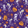 Purple Halloween skeletons and pumpkins pattern