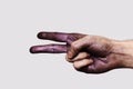 Purple Hand showing two Fingers