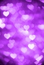 Purple heart bokeh background photo, abstract holiday backdrop Royalty Free Stock Photo