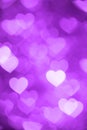 Purple heart bokeh background photo, abstract holiday backdrop Royalty Free Stock Photo